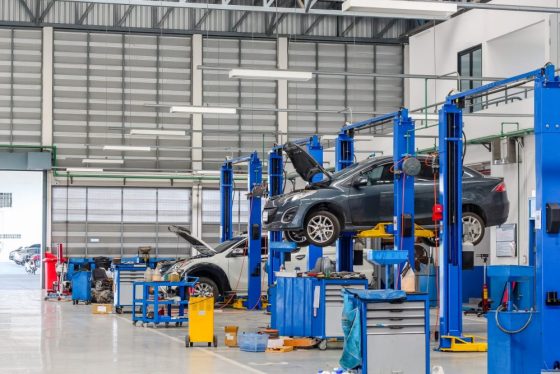 Automotive repair shop with vehicle lifts representing an auto repair business for sale in Markham
